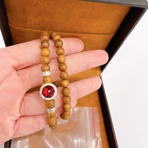 Real Agarwood Bracelet with Red Gem.